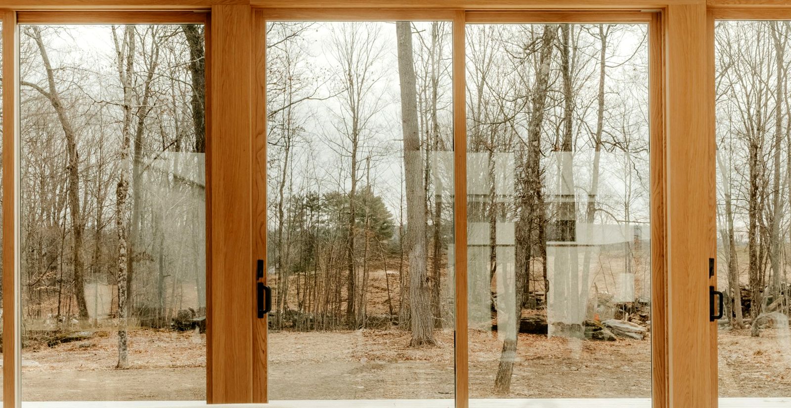 Clear new glass in a wood framed wall of windows